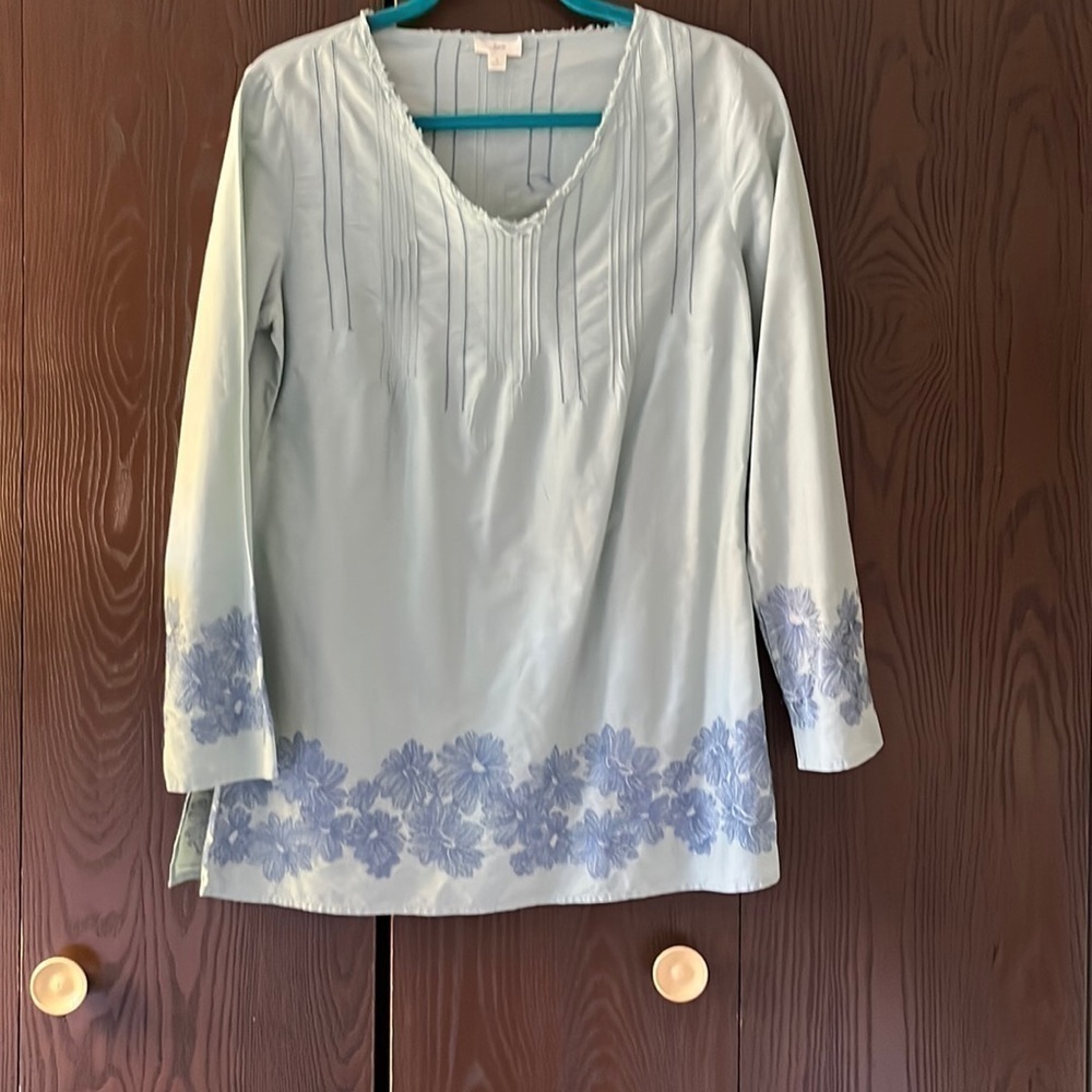 J Jill pale blue blouse with blue embroidered flowers on the bottom. Size Small